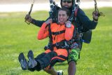 tandem skydivers coming in for landing